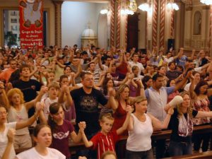 A Catholic Charismatic Renewal youth healing service in Brazil in 2009. Photo courtesy of Creative Commons